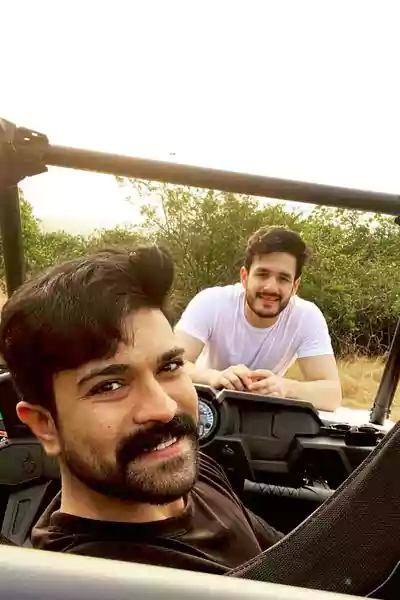 Akhil Akkineni with his cousin ram charan