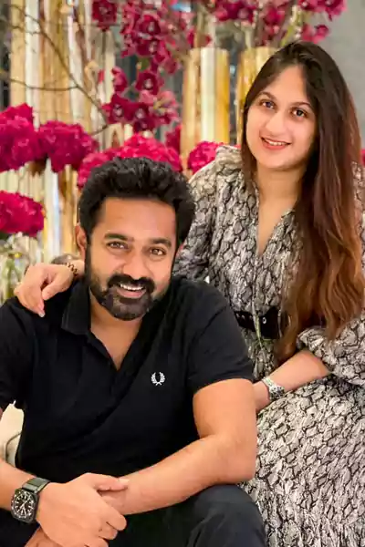 Asif Ali with his wife