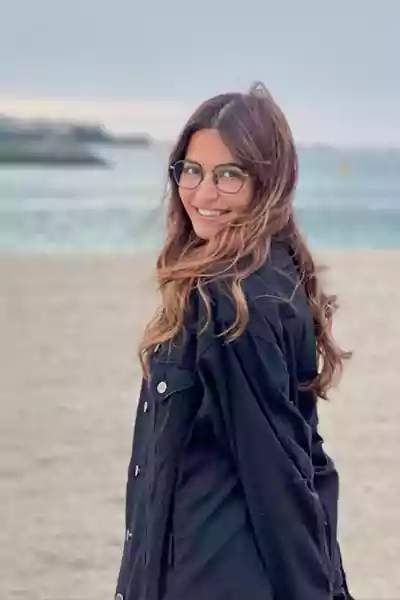 KRITI KHARBANDA on a beach
