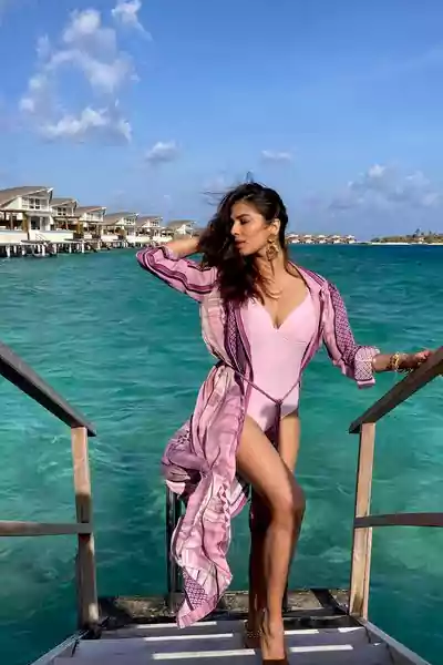 MALAVIKA MOHANAN in swimsuit
