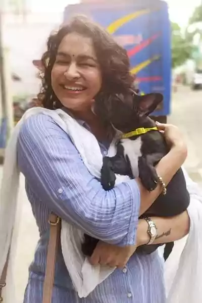 Misha Ghoshal with a dog