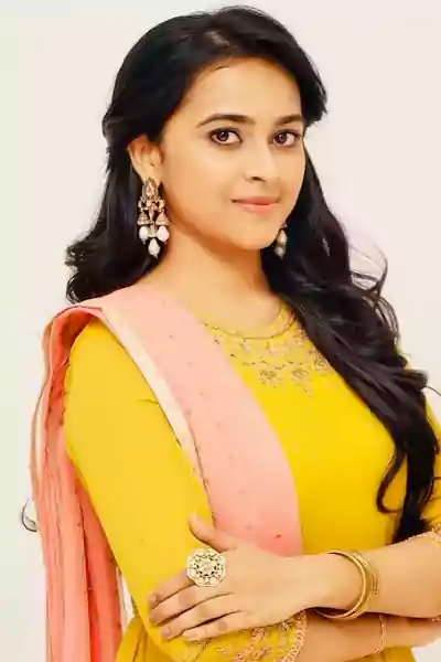 SRI DIVYA in yellow dress