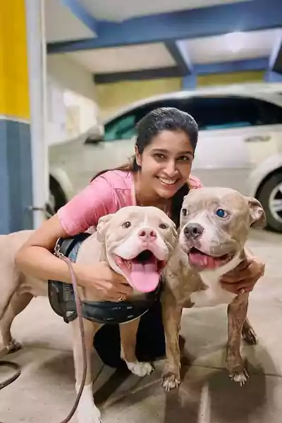 TANYA RAVICHANDRAN with her dogs